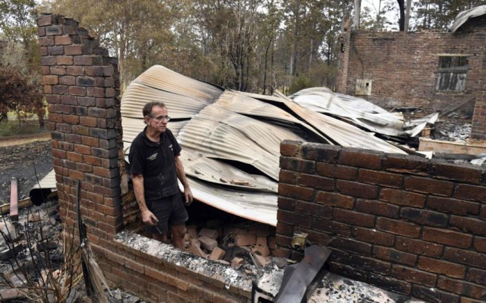 Maastopalo tuhosi kodin Nana Glenissä 600 kilometriä Sydneystä pohjoiseen. Lehtikuva/AFP