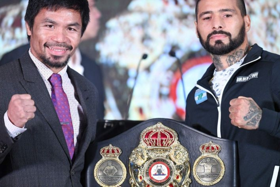 Manny Pacquiao ja Lucas Matthysse kamppailevat WBA:n välisarjan mestaruudesta. LEHTIKUVA / AFP