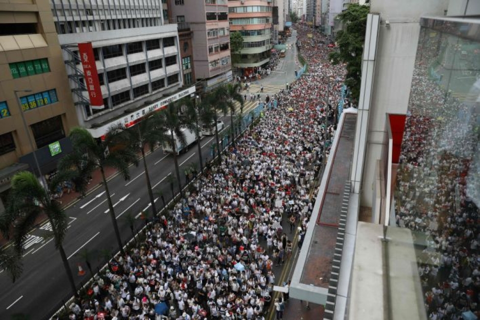 Lakiehdotus mahdollistaisi rikoksista epäiltyjen luovuttamisen Manner-Kiinaan. Ehdotus on herättänyt Hongkongissa ennennäkemätöntä vastustusta. LEHTIKUVA/AFP