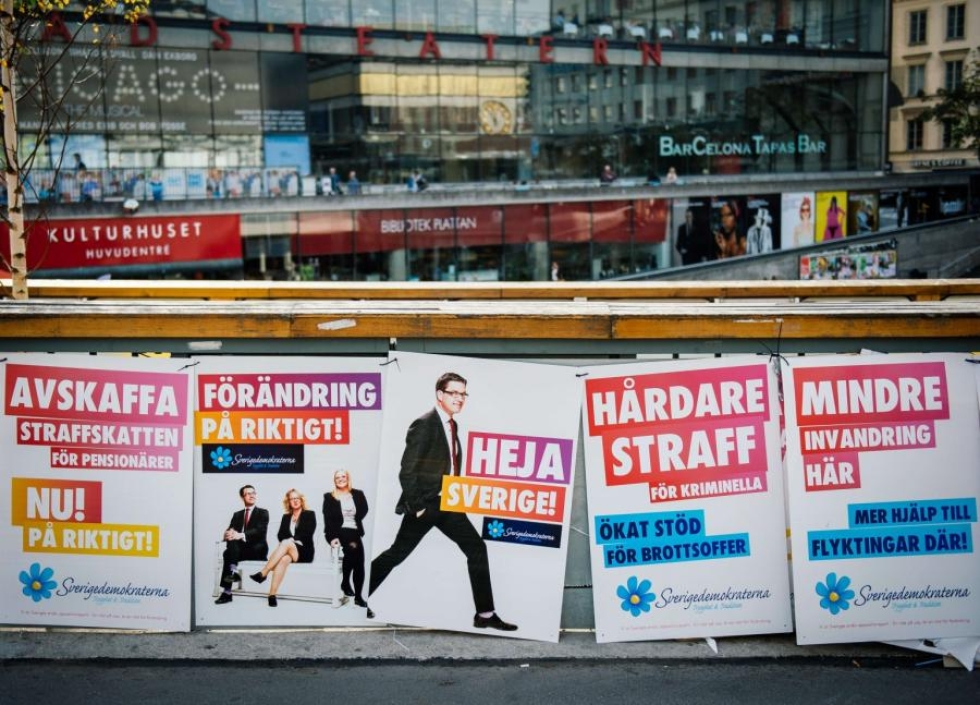 Ruotsidemokraattien vaalimainoksia Tukholman keskustassa 2014. LEHTIKUVA/AFP