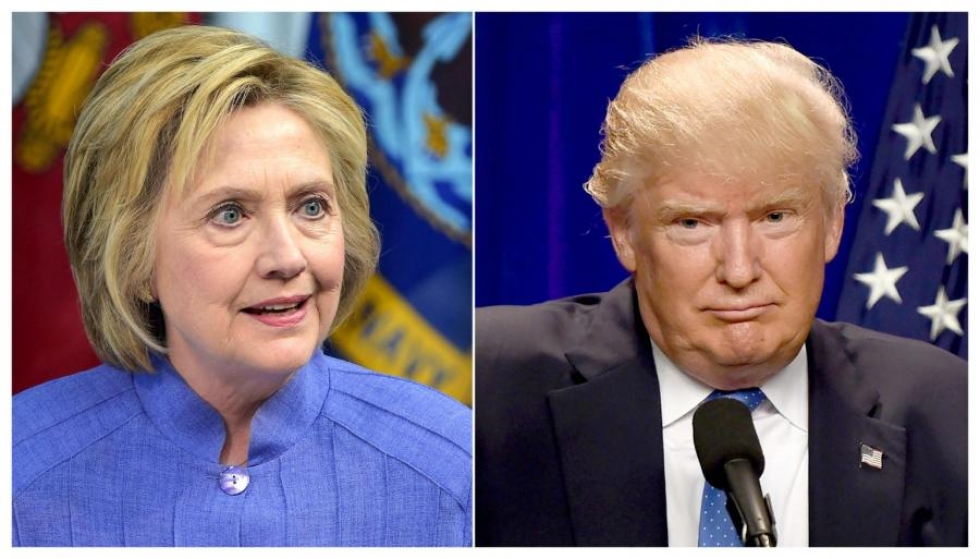 Sekä demokraattien Clinton että republikaanien Trump saavat NY Timesin kyselyssä 40 prosentin kannatuksen. LEHTIKUVA/AFP