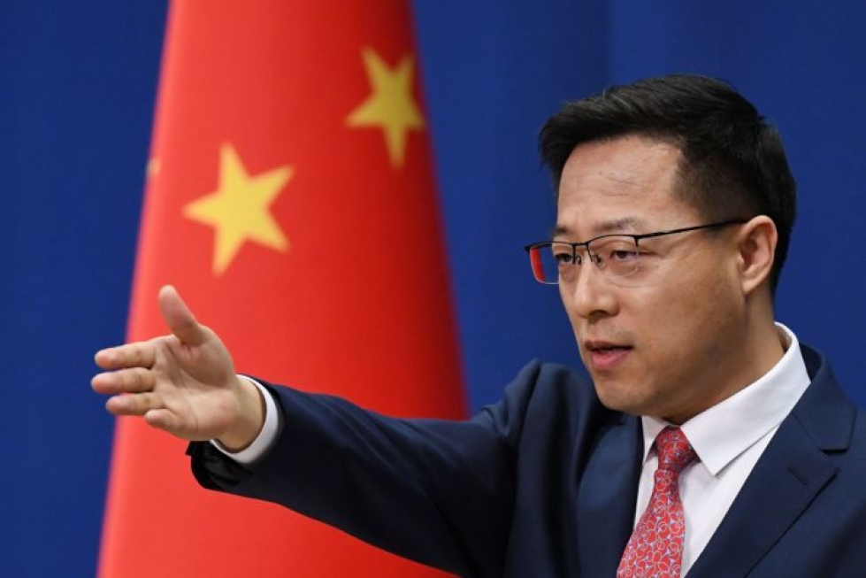 Yhdysvaltojen tekemien vääryyksien vuoksi Kiina on päättänyt asettaa viisumirajoituksia Yhdysvaltain kansalaisille, jotka ovat käyttäytyneet röyhkeästi Hongkongia koskevissa asioissa, Zhao sanoi. LEHTIKUVA / AFP
