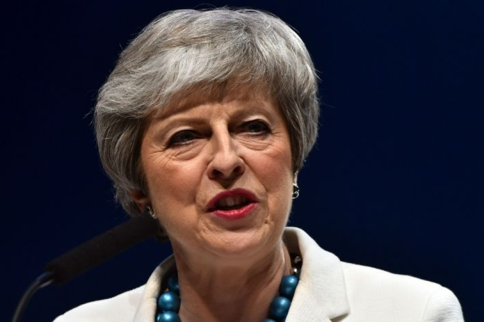 Theresa May on luvannut eroavansa, kun brexit-sopimus on saatu läpi parlamentissa. LEHTIKUVA/AFP