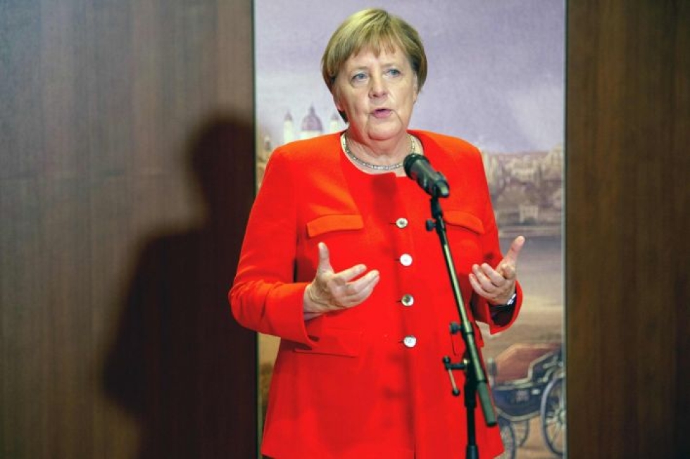 Merkelin mukaan sopimukseen on päästävä kuudesta kahdeksaan viikon kuluessa. Lehtikuva/AFP