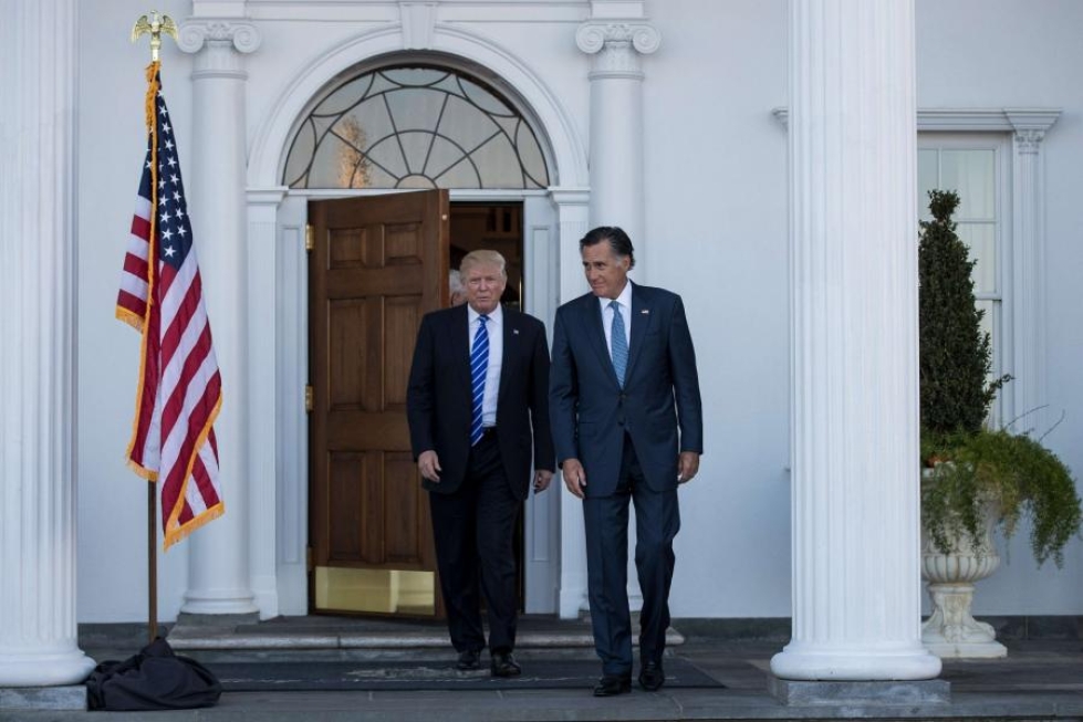 Donald Trump ja Mitt Romney tapasivat Trumpin omistamalla golf-klubilla. LEHTIKUVA/AFP
