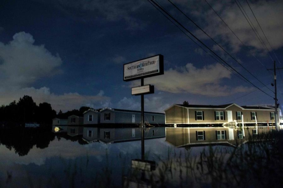 Louisianan kuvernöörin mukaan osavaltiota piinaavat tulvat ovat historiallisia. LEHTIKUVA/AFP