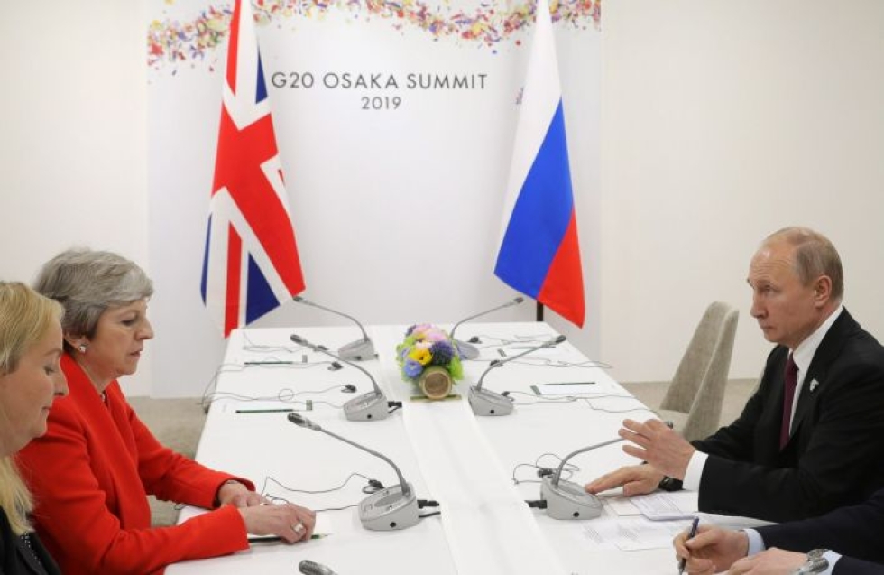 Britannia on tehnyt selväksi, että Mayn ja Putinin tapaaminen ei tarkoita maiden suhteiden lämpenemistä. LEHTIKUVA/AFP