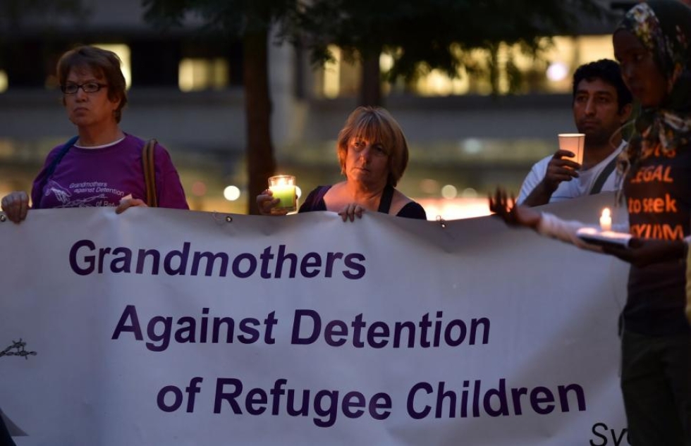 Australialaiset mielenosoittajat vastustavat pakolaislasten pitämistä Naurun pidätyskeskuksissa. LEHTIKUVA/AFP