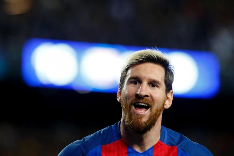 Messi teki hattutempun myös edellisessä Mestarien liigan pelissään syyskuussa Celticiä vastaan LEHTIKUVA / AFP