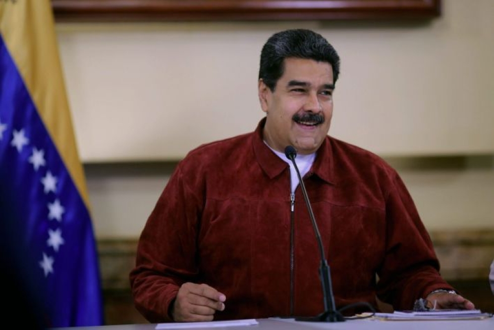 Venezuelan presidentin Nicolas Maduron tarjous lennättää venezuelalaisia takaisin on osa sosialistisen hallinnon Palaa kotimaahan -hanketta. LEHTIKUVA/AFP