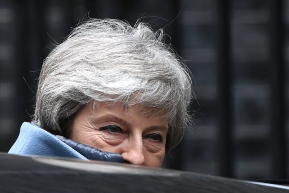 Theresa Mayn ilmoituksesta ei selvinnyt tarkasti, aikooko hän lähteä heti erosopimuksen mahdollisen hyväksymisen jälkeen vai vasta EU-eron toteuduttua. LEHTIKUVA/AFP