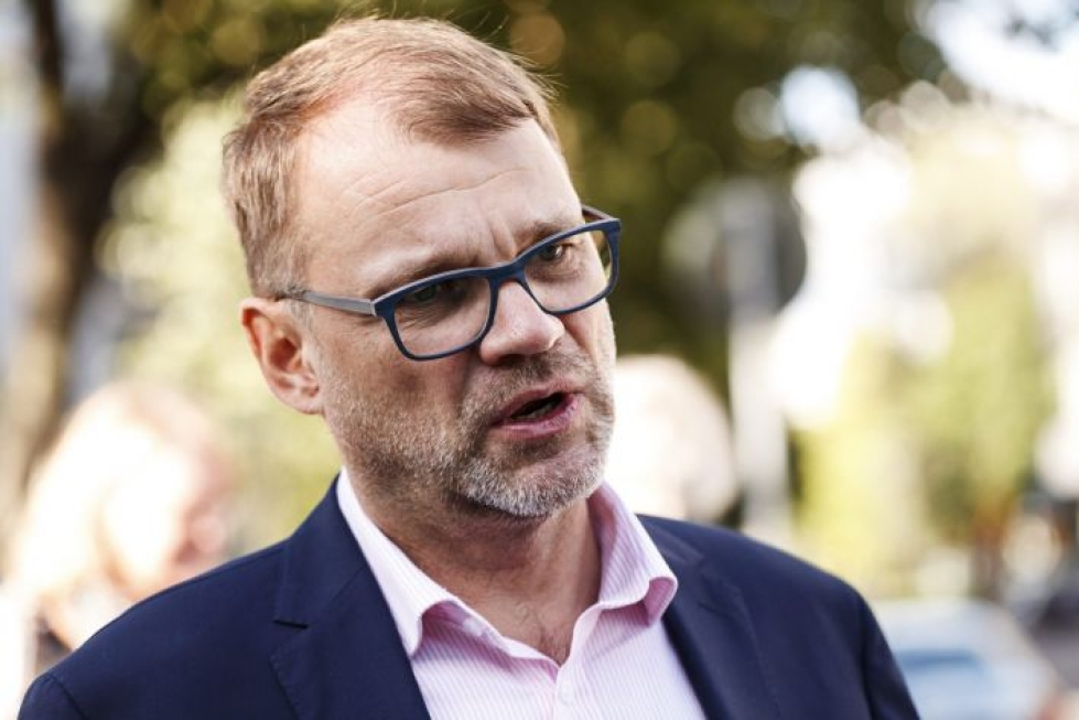 Pääministeri Juha Sipilä (kesk.) nosti ovensuukyselyjen perusteella vaalien selväksi voittajaksi ruotsidemokraatit. LEHTIKUVA / RONI REKOMAA