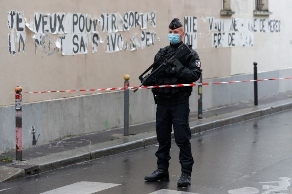 Pariisin perjantainen isku tapahtui lähellä entisiä Charlie Hebdon toimitusta.  LEHTIKUVA / AFP