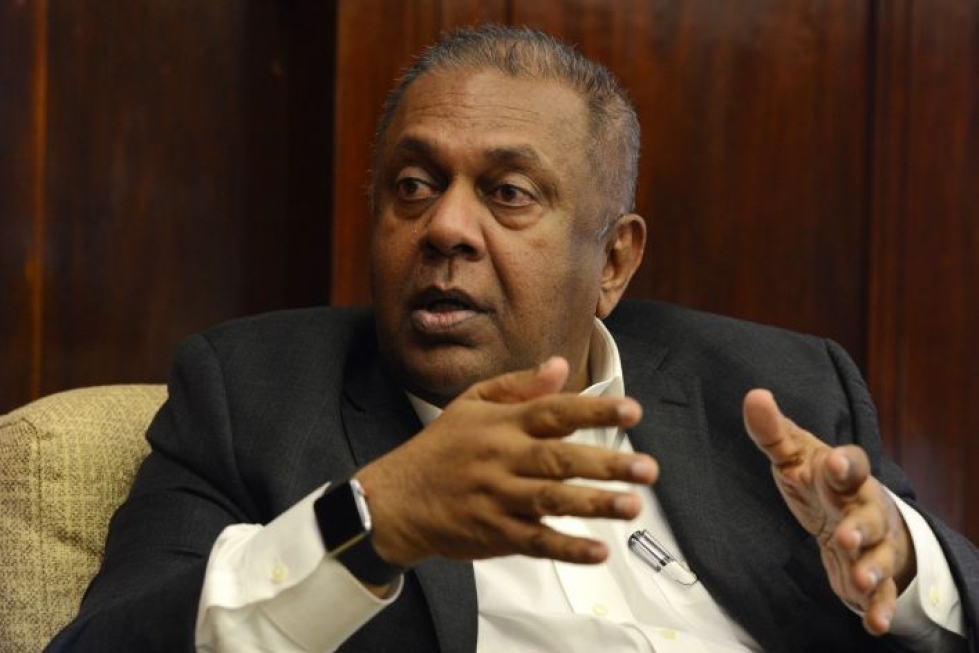Valtiovarainministeri Mangala Samaraweera sanoo, että kuluneet viisi vuotta eivät ole olleet helppoja Sri Lankalle. LEHTIKUVA / AFP