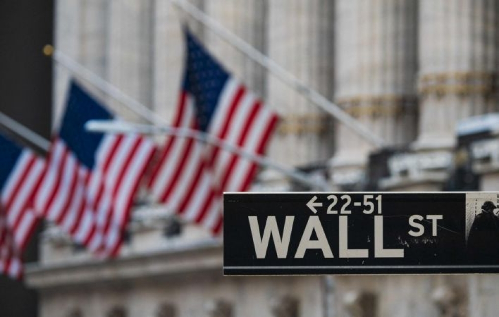 Wall Streetin pörssissä on rikottu ennätyksiä jälleen sen jälkeen, kun Yhdysvaltain kongressi hyväksyi maaliskuussa 1,9 biljoonan dollarin koronaelvytyspaketin. LEHTIKUVA / AFP