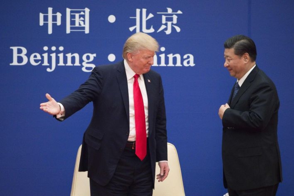 Yhdysvaltain presidentti Donald Trump ja Kiinan presidentti Xi Jinping tapasivat loppuvuodesta 2017 Pekingissä. LEHTIKUVA / AFP