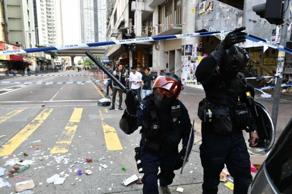 Poliisit saartoivat alueen, jolla mielenosoittajia ammuttiin. Lehtikuva/AFP