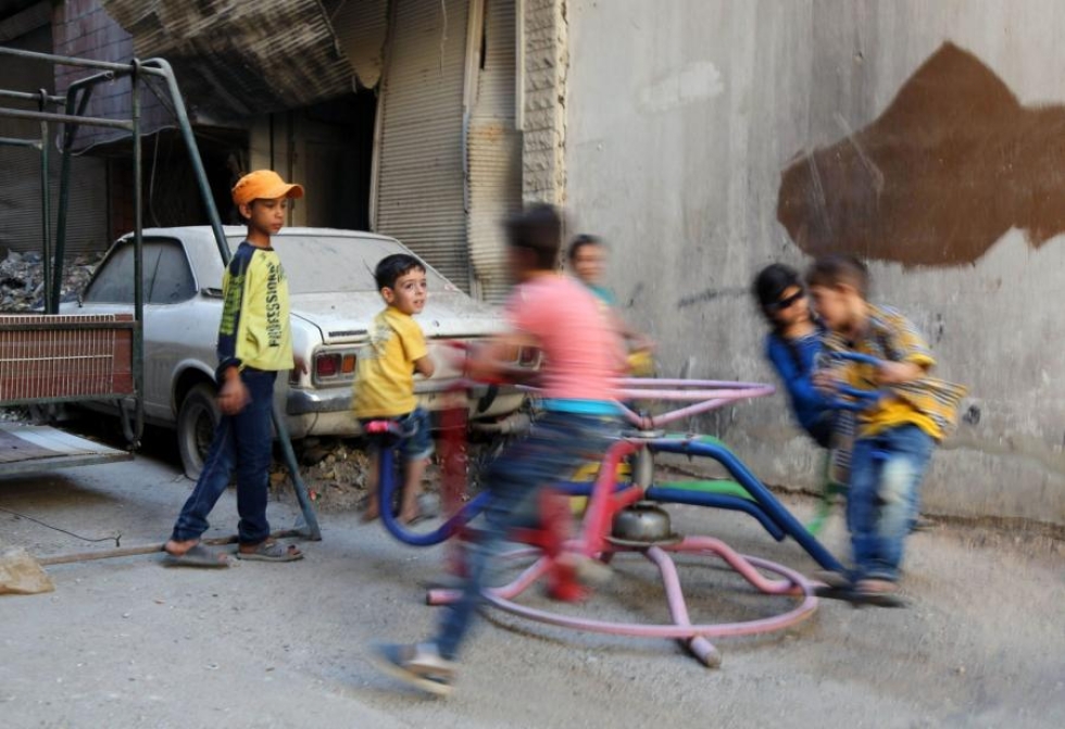Syyrialaislapsia leikkimässä Arbinin kaupungissa 13. syyskuuta. LEHTIKUVA/AFP
