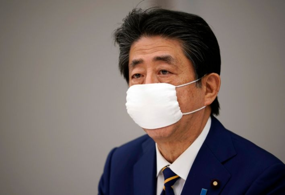 Pääministeri Shinzo Aben julistama poikkeustila astuu voimaan seitsemällä alueella, muun muassa Tokiossa ja Osakassa.  LEHTIKUVA/AFP
