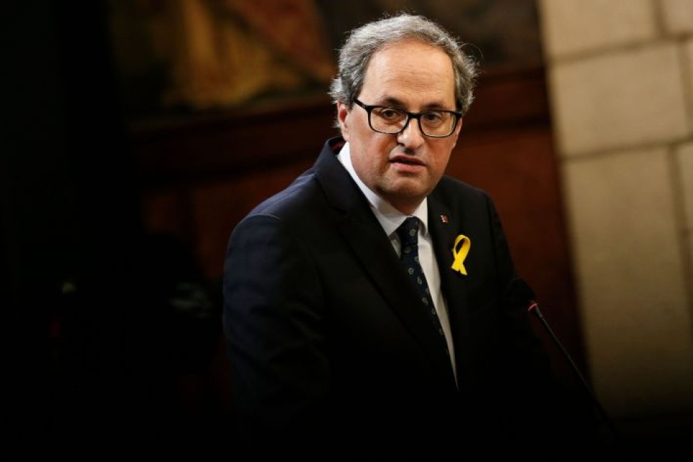 Torra ei oikeuden mukaan noudattanut vaaliviranomaisten käskyä poistaa Katalonian itsenäistymisliikkeen symboleja Katalonian hallintorakennuksista ennen europarlamentti- ja paikallisvaaleja viime vuoden maaliskuussa. LEHTIKUVA/AFP