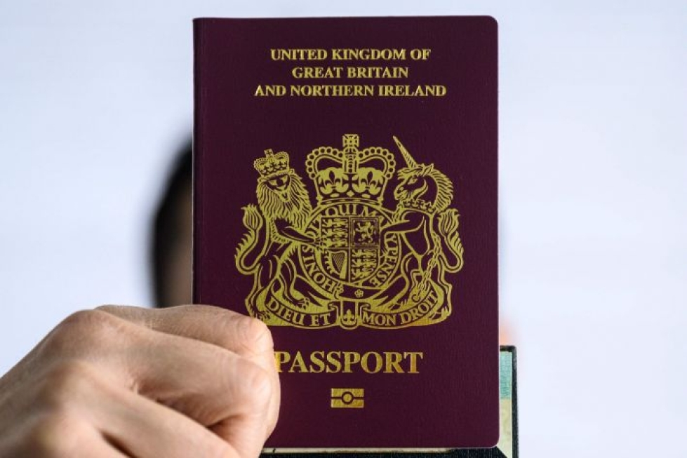 BNO-passi Hongkongin kansalaisille oli kompromissi, joka syntyi, kun Hongkongin asukkaat halusivat täyden Britannian kansalaisuuden, mutta Kiina kieltäytyi hyväksymästä ajatusta. LEHTIKUVA / AFP