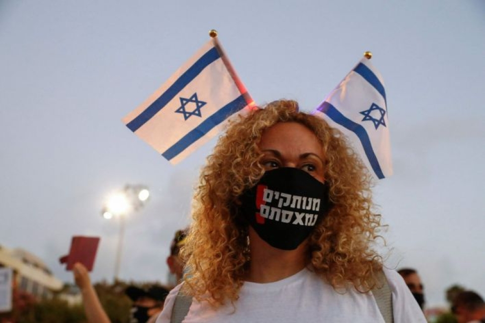Israelin hallitus on joutunut kritiikin kohteeksi koronatoimiensa vuoksi. LEHTIKUVA/AFP