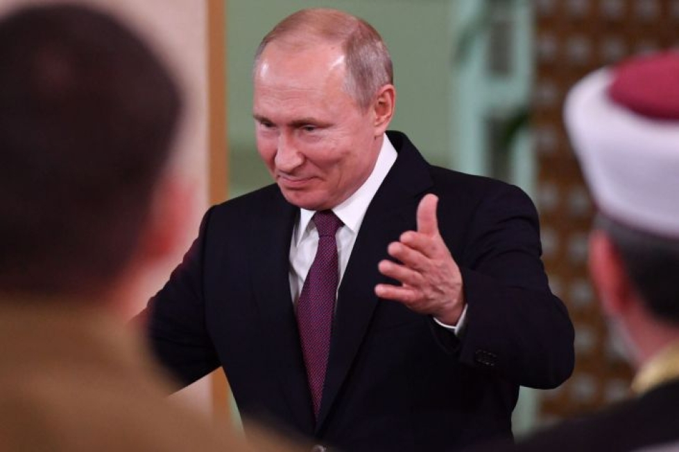 Ihmisoikeusaktivistien mukaan Putin on vähitellen tukahduttanut vapauksia Venäjällä siitä lähtien, kun hänet valittiin ensi kerran presidentiksi vuonna 2000. LEHTIKUVA / AFP