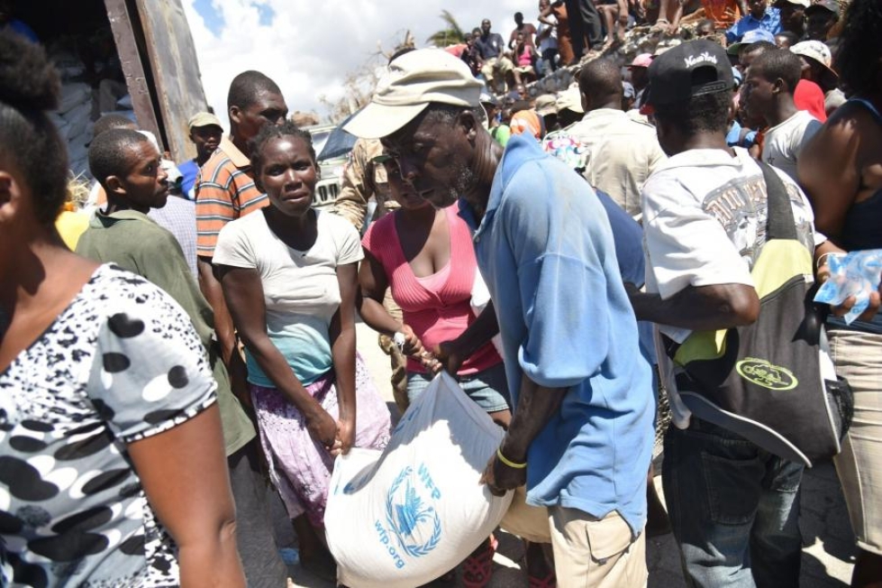 Ainakin 1,4 miljoonaa ihmistä on pikaisen humanitaarisen avun tarpeessa Haitissa. LEHTIKUVA/AFP
