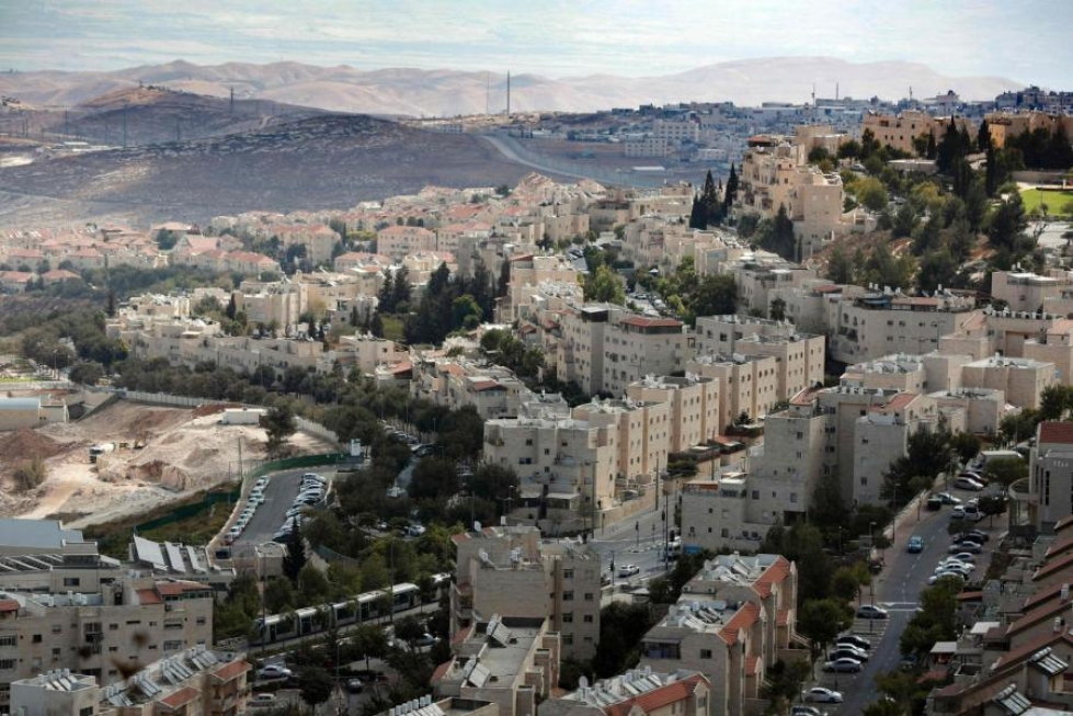 Israel ilmoitti sunnuntaina aikovansa rakentaa lähes 600 asuintaloa siirtokuntiinsa. LEHTIKUVA/AFP