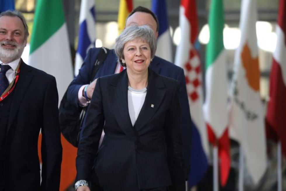 Pääministeri Theresa May kertoi muille EU-maille vaikeudestaan saada erosopimusta läpi maan parlamentissa. EU-maat julkaisivat illalla kirjalliset loppupäätelmät, joissa ne kertaavat erosopimuksen periaatteita. LEHTIKUVA/AFP