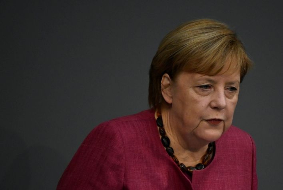 Merkel puolustaa uusia koronarajoituksia ja sanoo niitä välttämättömiksi. LEHTIKUVA/AFP