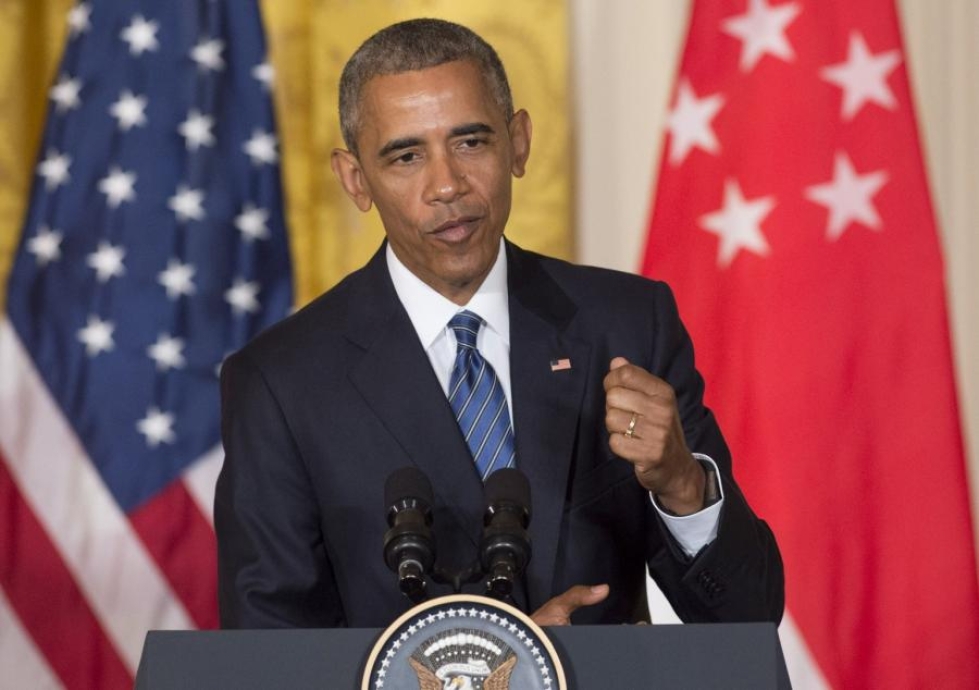 Yhdysvaltojen presidentti Barack Obama yrittää muuttaa oikeusjärjestelmää oikeudenmukaisemmaksi. LEHTIKUVA/AFP