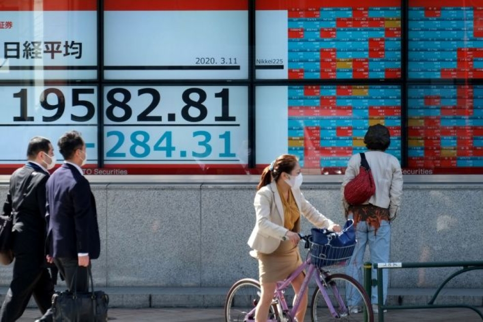 Aasiassa oli tänään pörsseissä miinuspäivä. LEHTIKUVA/AFP