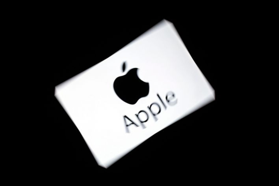 Joukkokanteen mukaan Apple käyttää hyväksi monopoliasemaansa hinnoittelussa. LEHTIKUVA/AFP