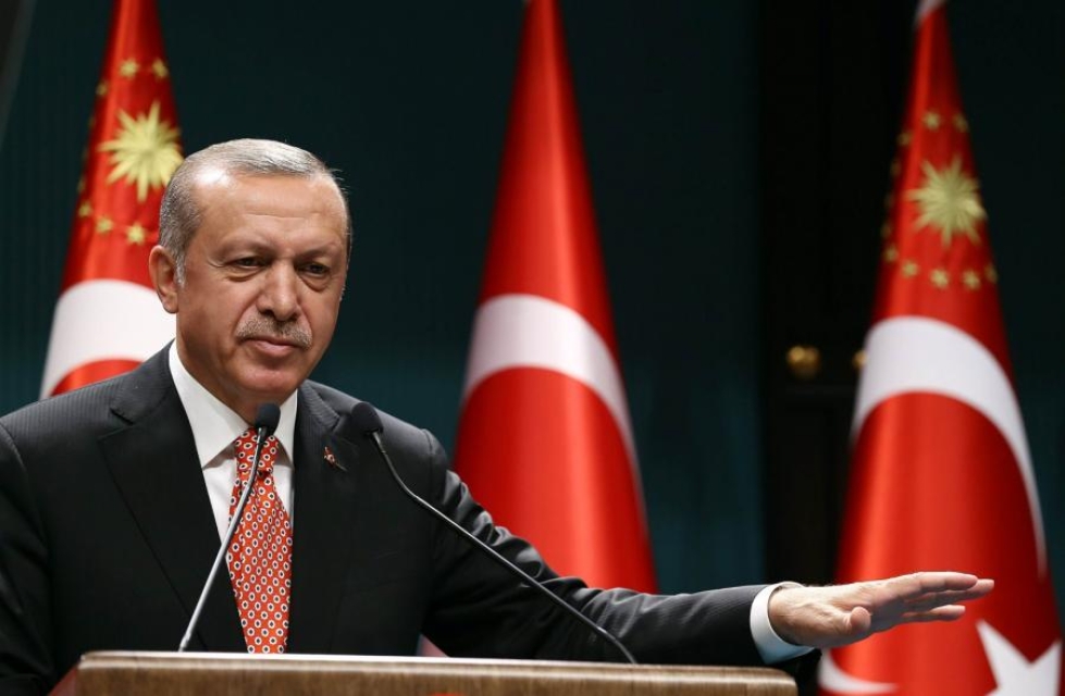 Turkin presidentti  Recep Tayyip Erdogan kehotti perjantaina maansa vallankaappausyrityksen jälkeisiä toimia kommentoineita EU:ta ja Yhdysvaltoja pitämään huolta omista asioistaan. LEHTIKUVA/AFP