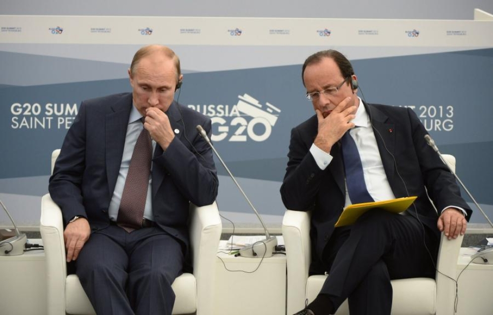 Syyskuussa 2013 Ranskan presidentti President Francois Hollande (oik.) ja Venäjän presidentti Vladimir Putin kuvattuna yhdessä G20-kokouksen aikaan Pietarissa. LEHTIKUVA/AFP