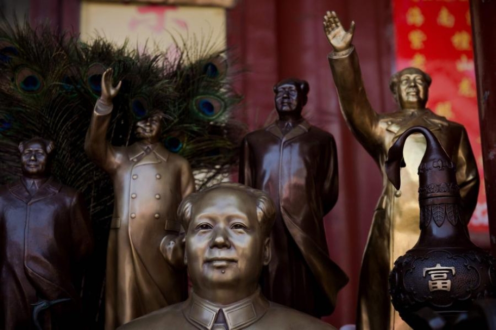Puhemies Mao Tse-tungin patsaita kaupan torilla Pekingissä. LEHTIKUVA/AFP
