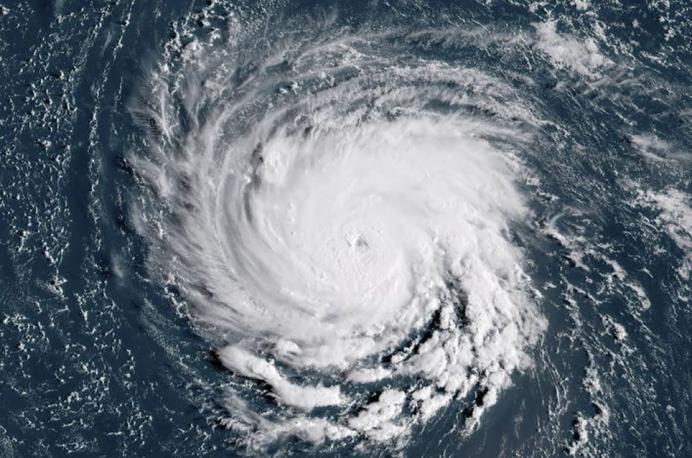 Synkimpien ennusteiden mukaan Florencesta saattaa tulla voimakkain alueelle iskenyt myrsky vuosikymmeniin. LEHTIKUVA / AFP