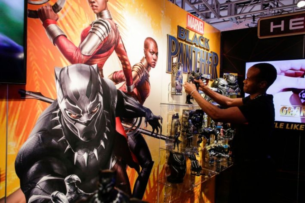 Helmikuussa ensi-iltansa saanut Marvelin huippusuosittu Black Panther oli tämän vuoden suurimpia elokuvailmiöitä maailmassa. Lehtikuva/AFP