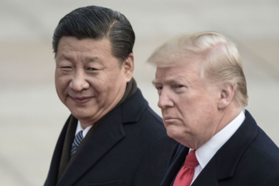 Epävarmuutta on lisännyt myös Kiinan ja Yhdysvaltain kauppasota, joka näytetään kuitenkin saavan lähiaikoina päätökseen. Kuvassa Kiinan presidentti Xi Jinping ja Yhdysvaltain presidentti Donald Trump. LEHTIKUVA/AFP