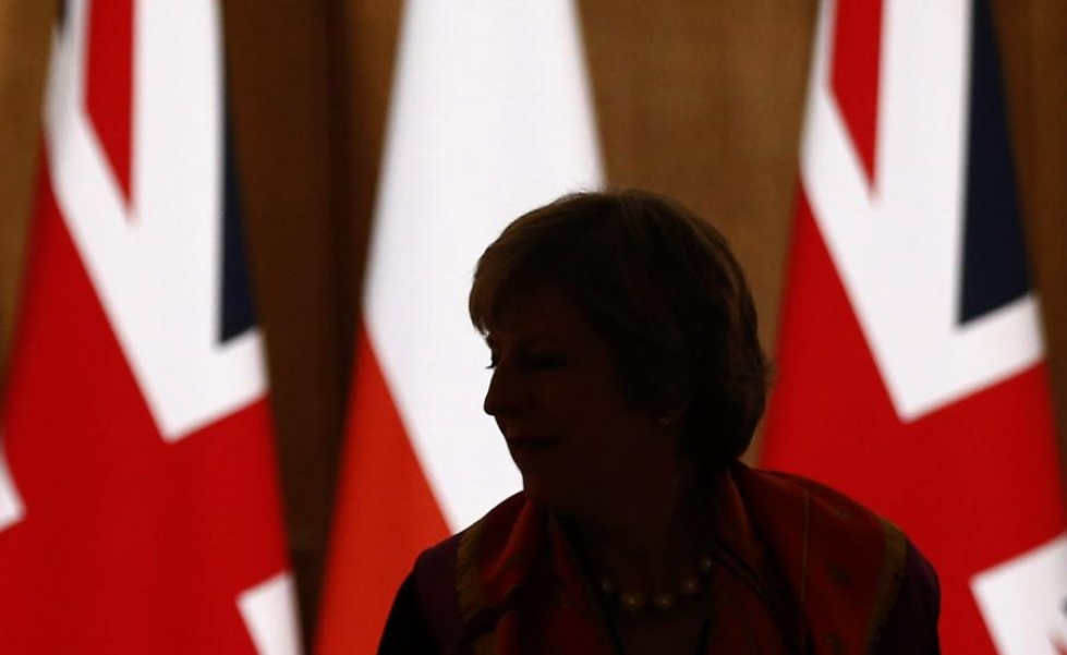 Pääministeri Theresa May haluaa käynnistää eroprosessin viimeistään maaliskuussa. LEHTIKUVA/AFP