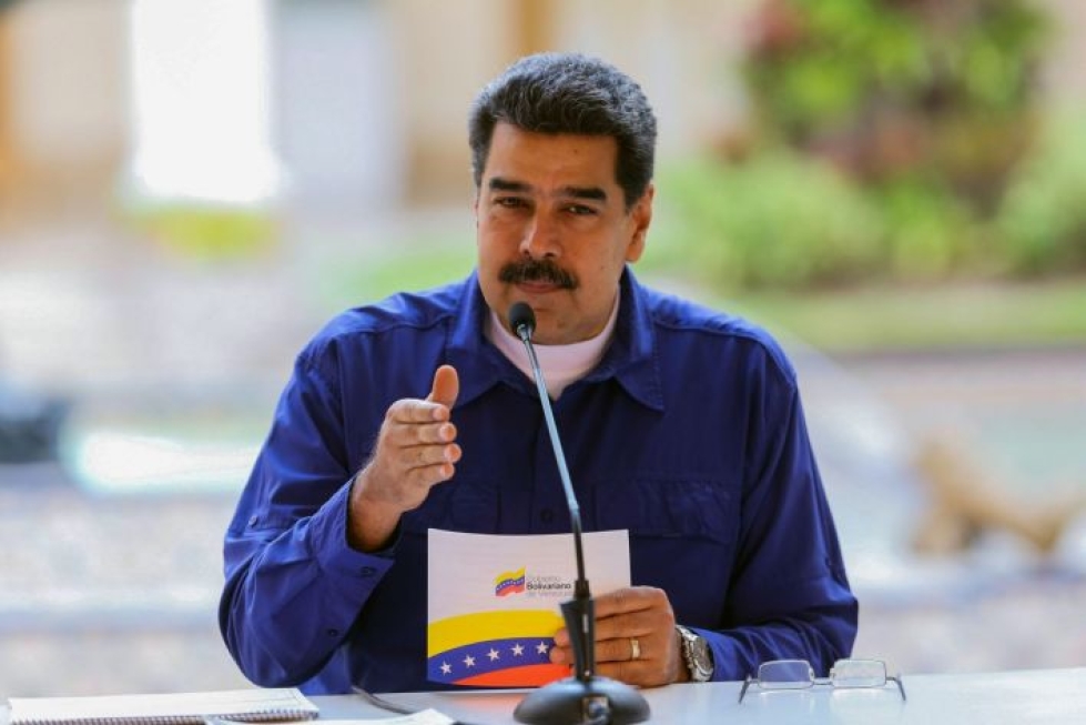 Venezuelan presidentti Nicolas Maduro kertoi valmiudesta ottaa vastaan apua tavattuaan Punaisen Ristin johtajan Caracasissa. LEHTIKUVA/AFP