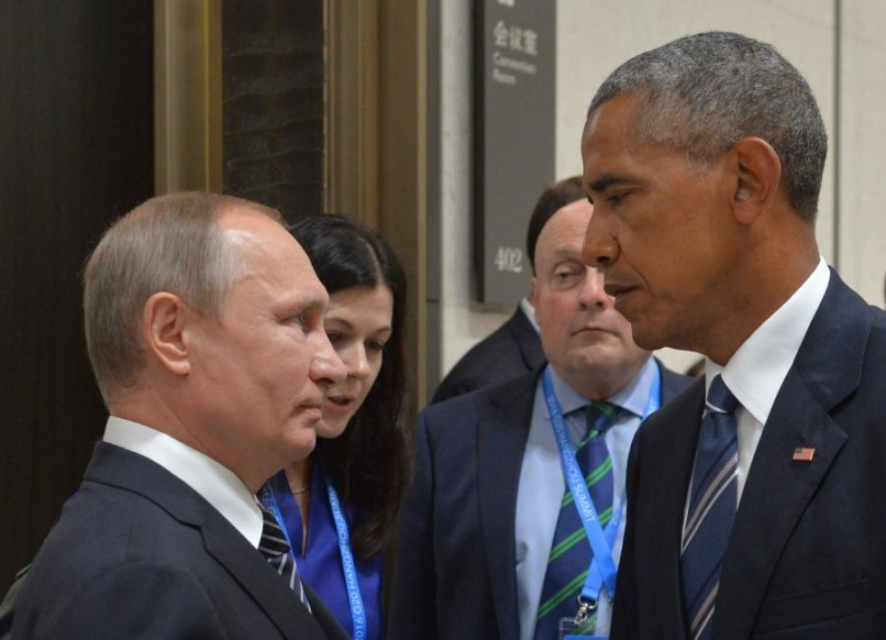 Presidentit Barack Obama ja Vladimir Putin keskustelivat kokouksessa.  LEHTIKUVA / AFP