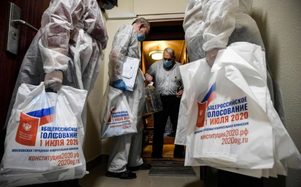 Koronapandemia muutti äänetysajankohtaa ja -käytäntöjä. Lehtikuva/AFP
