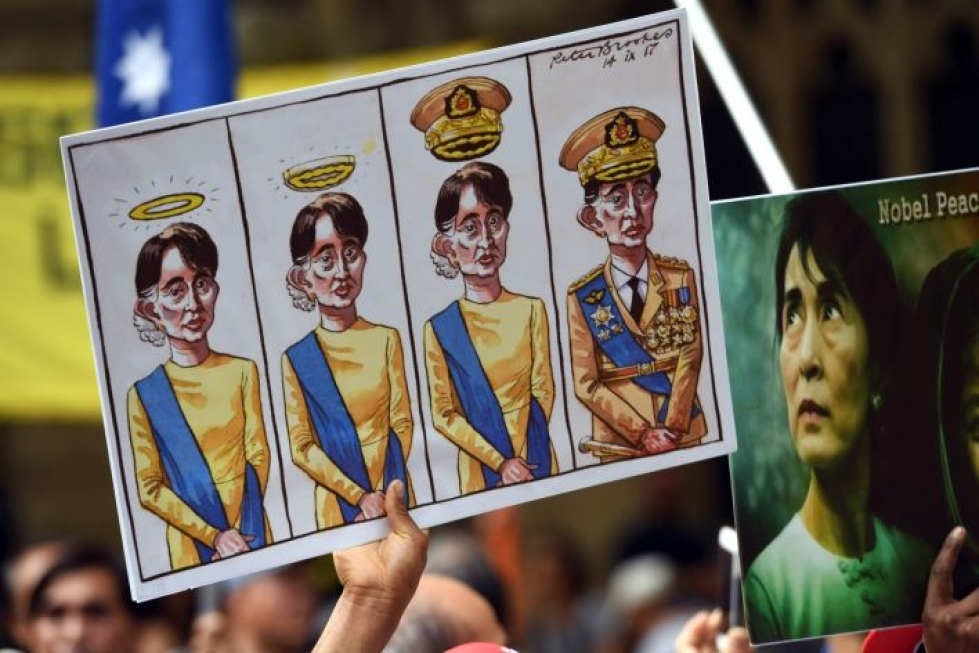 Raportti kritisoi myös Nobelin rauhanpalkinnon saanutta, maan siviilihallintoa johtavaa Aung San Suu Kyitä. Lehtikuva/AFP