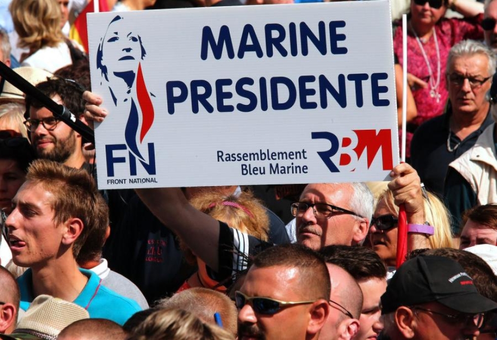 Kansallisen rintaman johtaja Marine Le Pen kerää ääniä islaminvastaisella linjallaan. LEHTIKUVA / Francois Nascimbeni