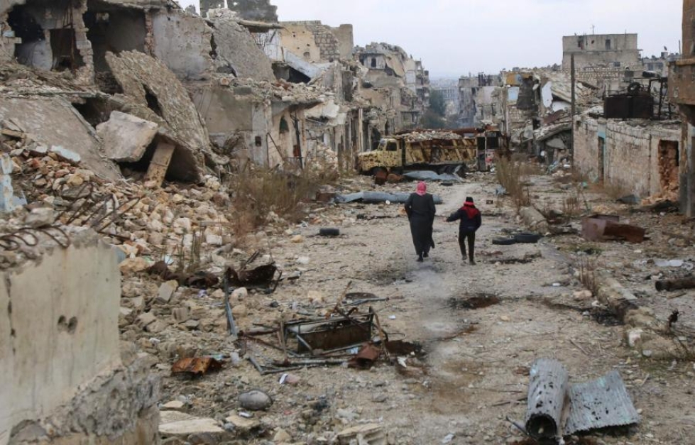Syyrian Aleppoon matkalla olleita avustusrekkoja tuhoutui ja useita ihmisiä kuoli ilmaiskussa syyskuussa. LEHTIKUVA/AFP