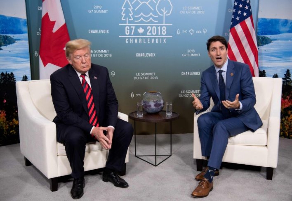 Trump ja Trudeau ovat kerrankin samaa mieltä jostain. Lehtikuva / AFP