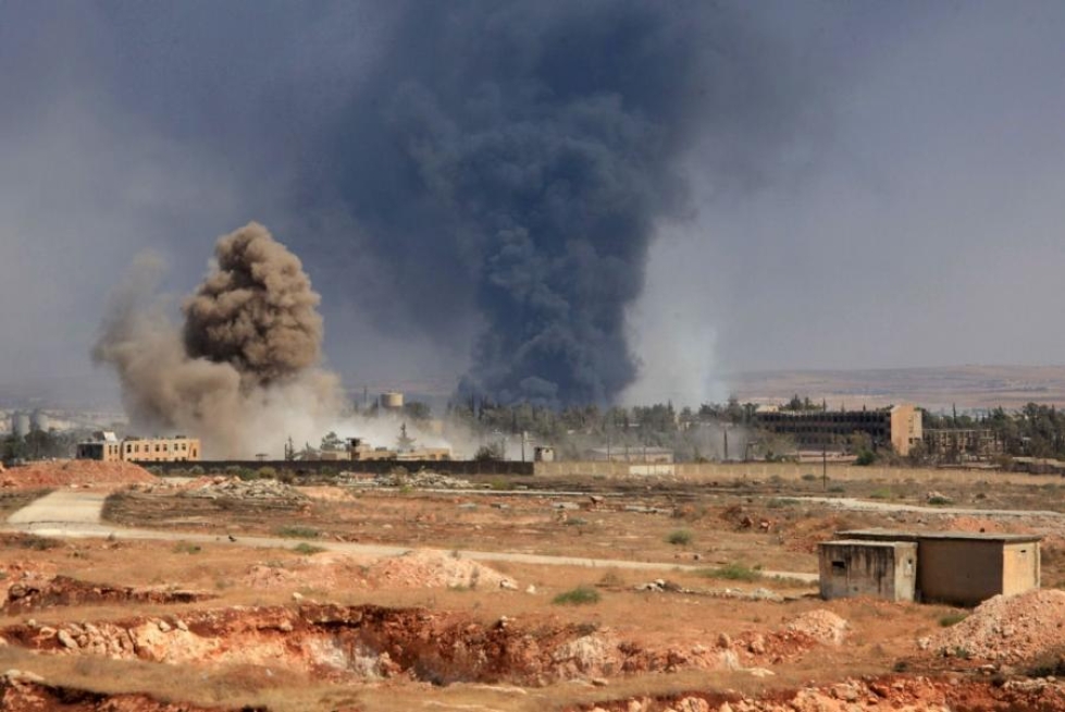 Syyrian hallituksen ilmahyökkäykset aihettivat räjähdyksiä Aleppon eteläosissa eilen. LEHTIKUVA/AFP
