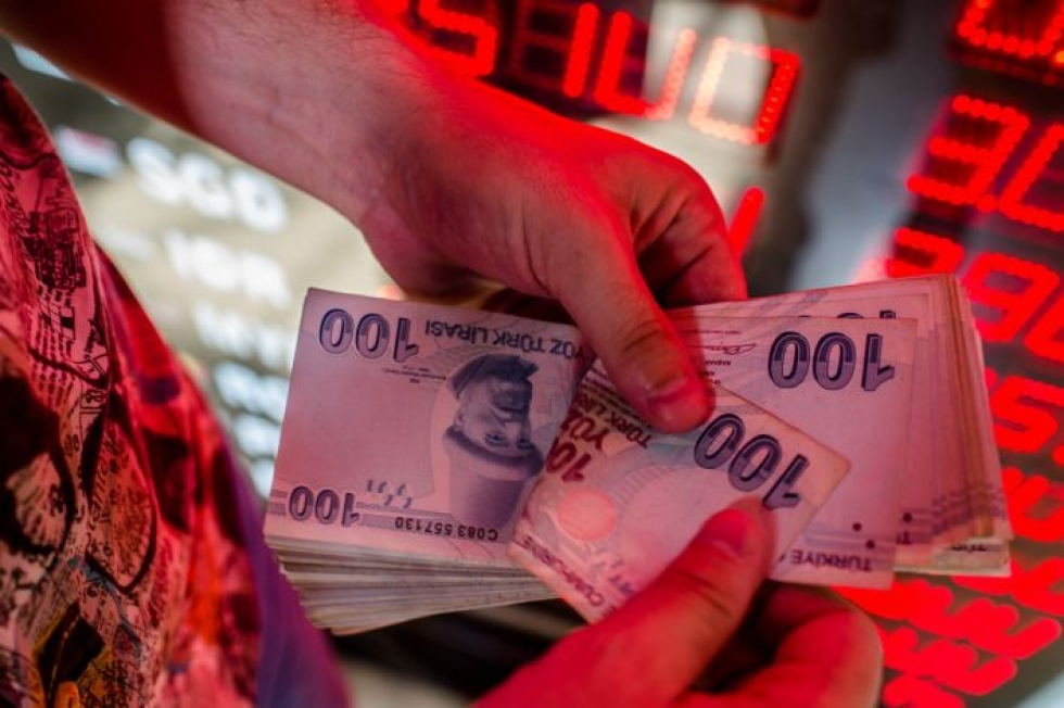 Turkin talousvaikeudet ovat näkyneet kovana inflaationa ja liiran heikentymisenä. LEHTIKUVA/AFP